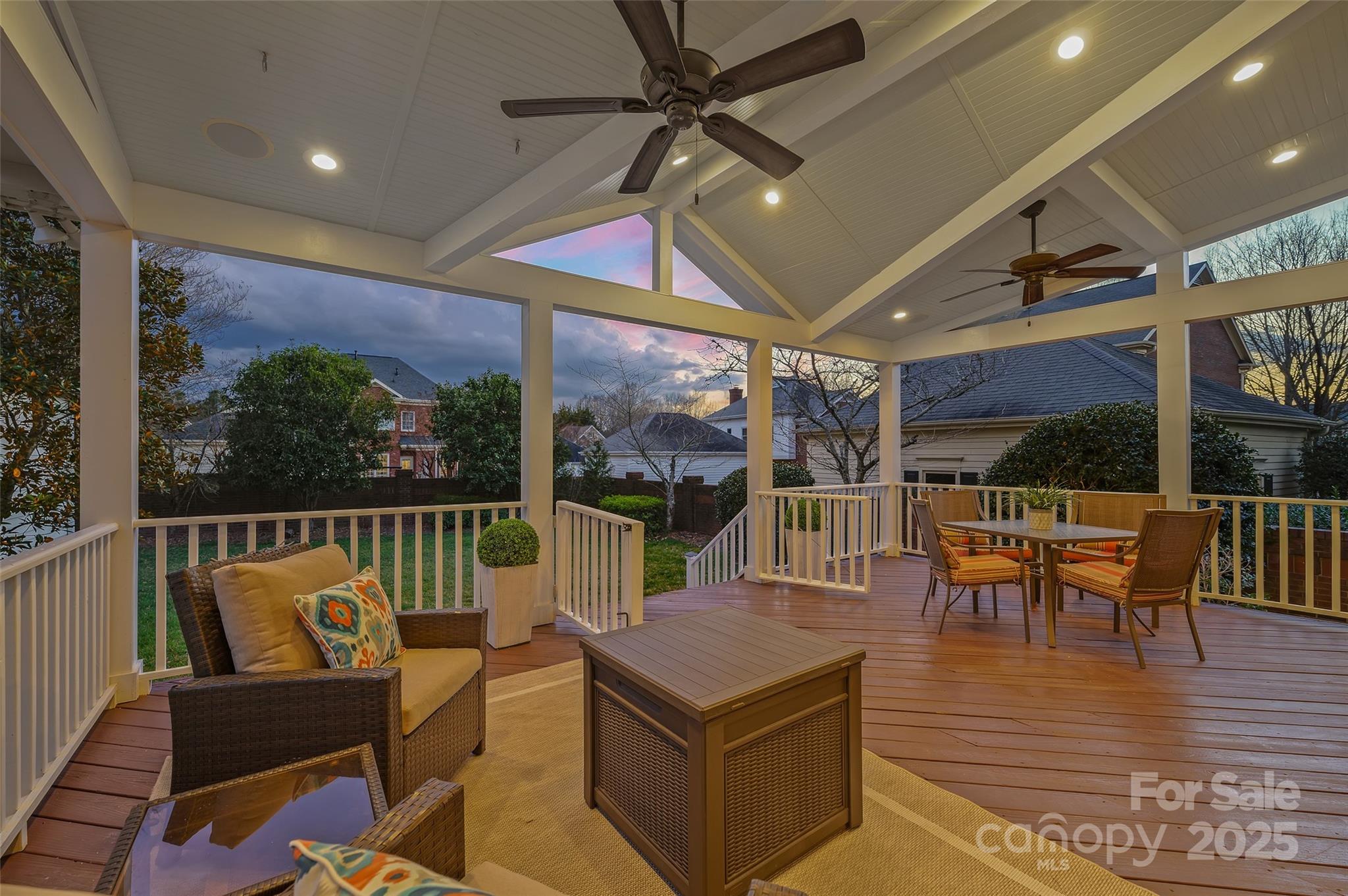 7704 Sharpthorne Place Charlotte, NC 28270 - Photo 26 of 34 a roof deck with table and chairs