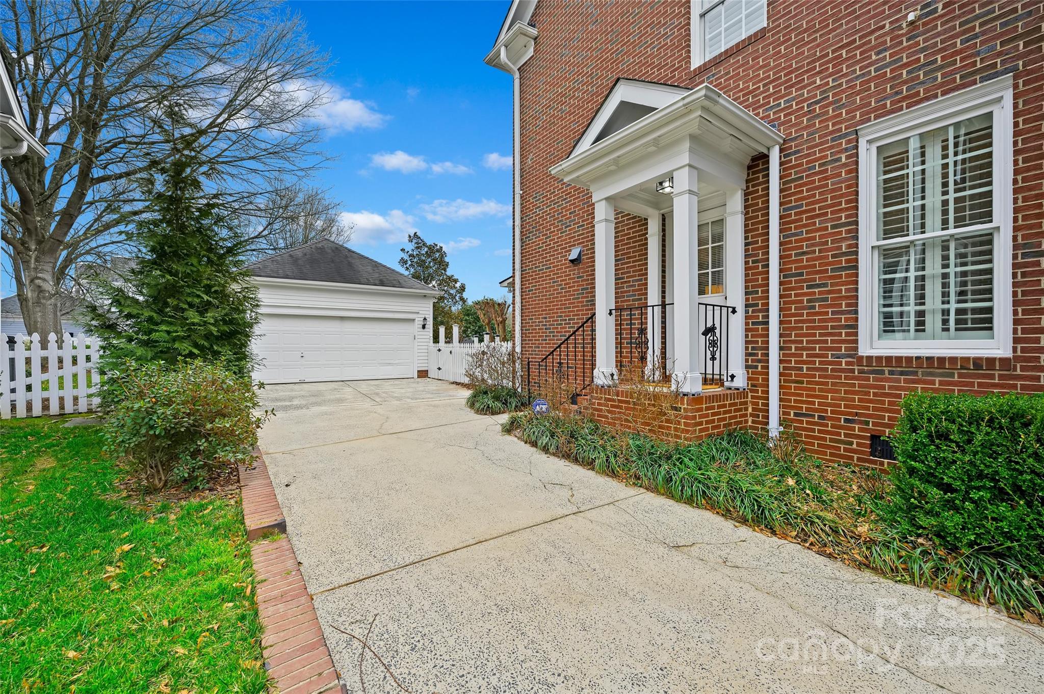 7704 Sharpthorne Place Charlotte, NC 28270 - Photo 30 of 34 front view of a house with a yard