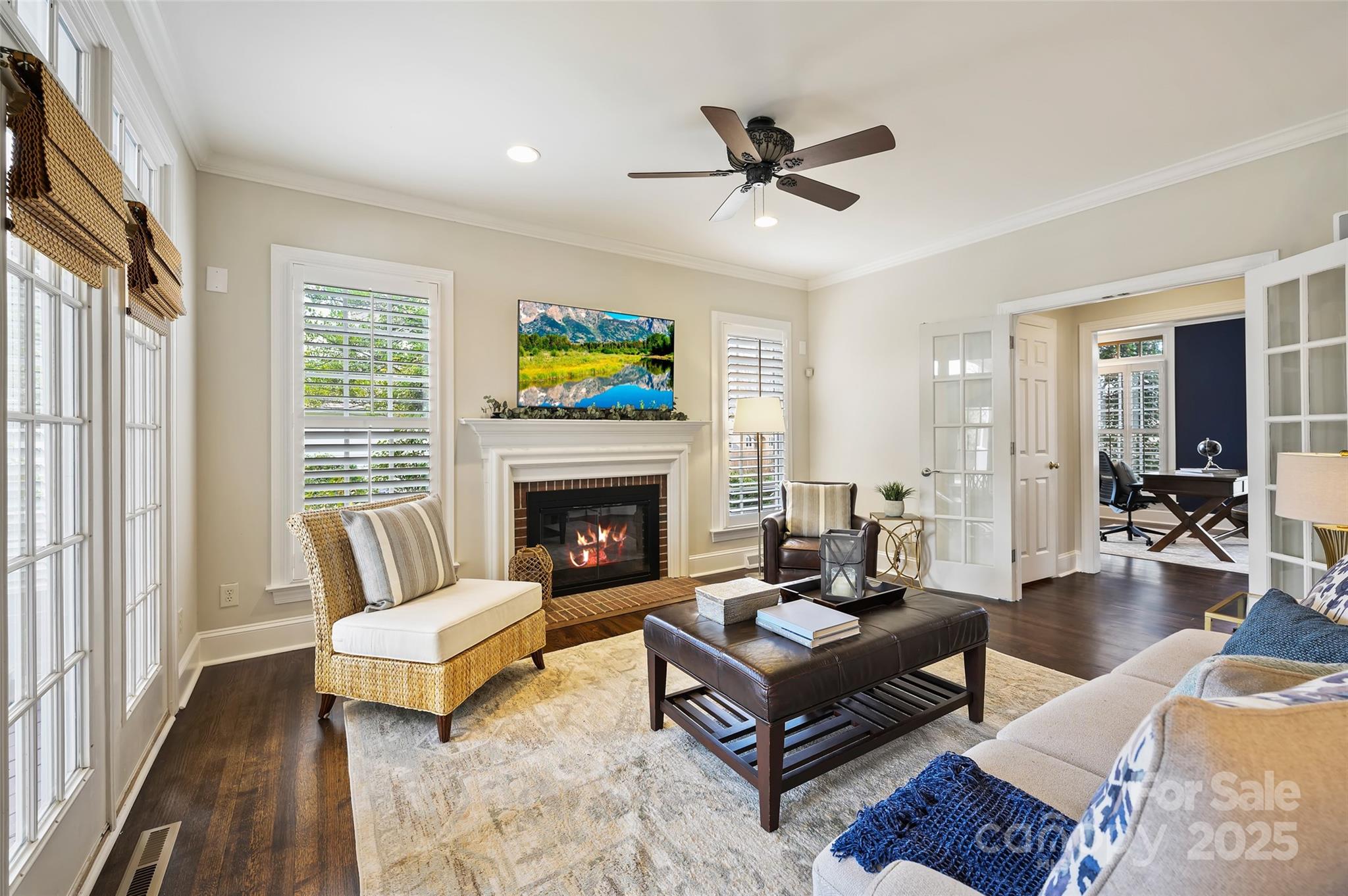 7704 Sharpthorne Place Charlotte, NC 28270 - Photo 5 of 34 a living room with furniture and a fireplace
