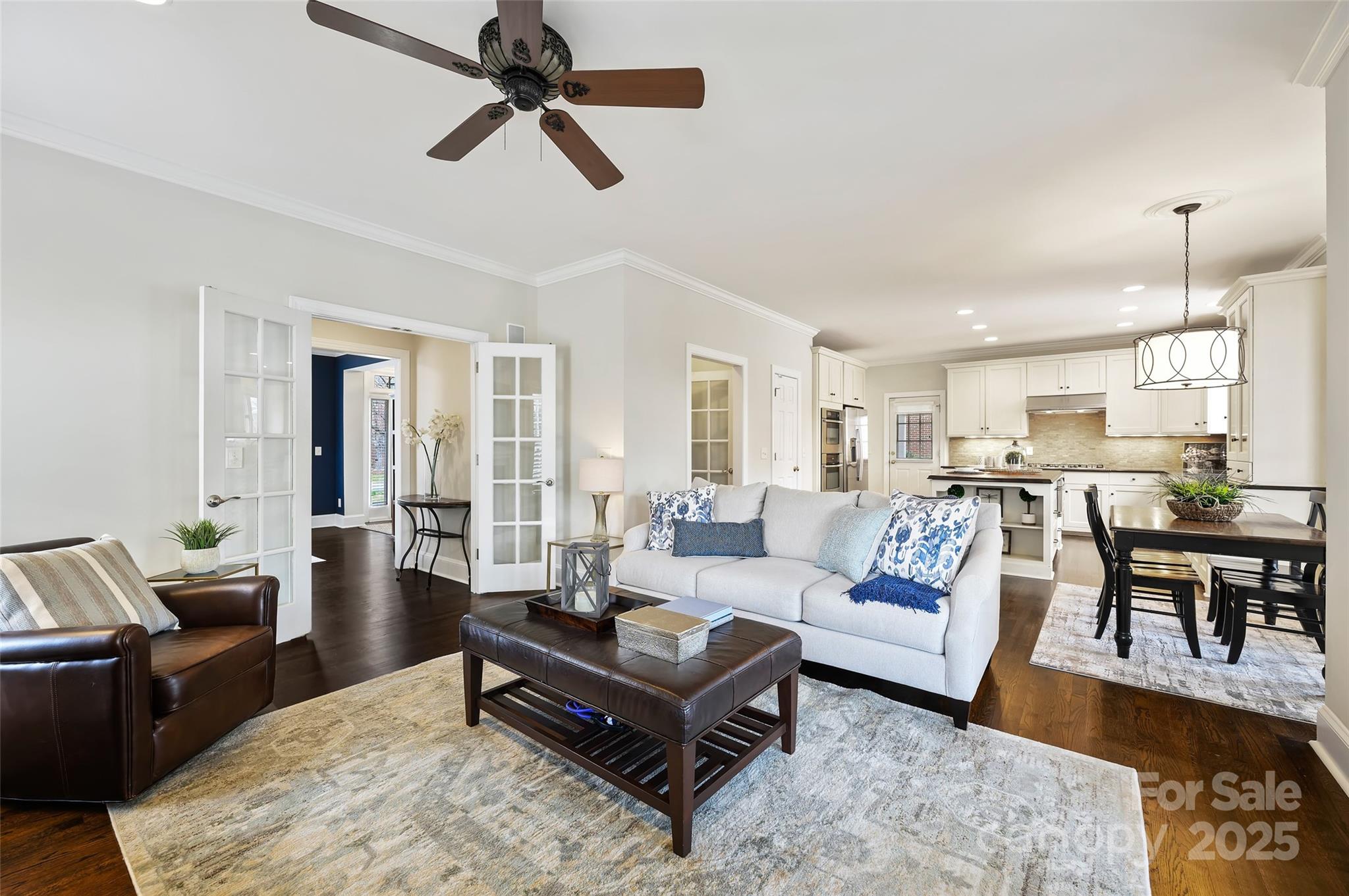 7704 Sharpthorne Place Charlotte, NC 28270 - Photo 7 of 34 a living room with furniture kitchen view and a window