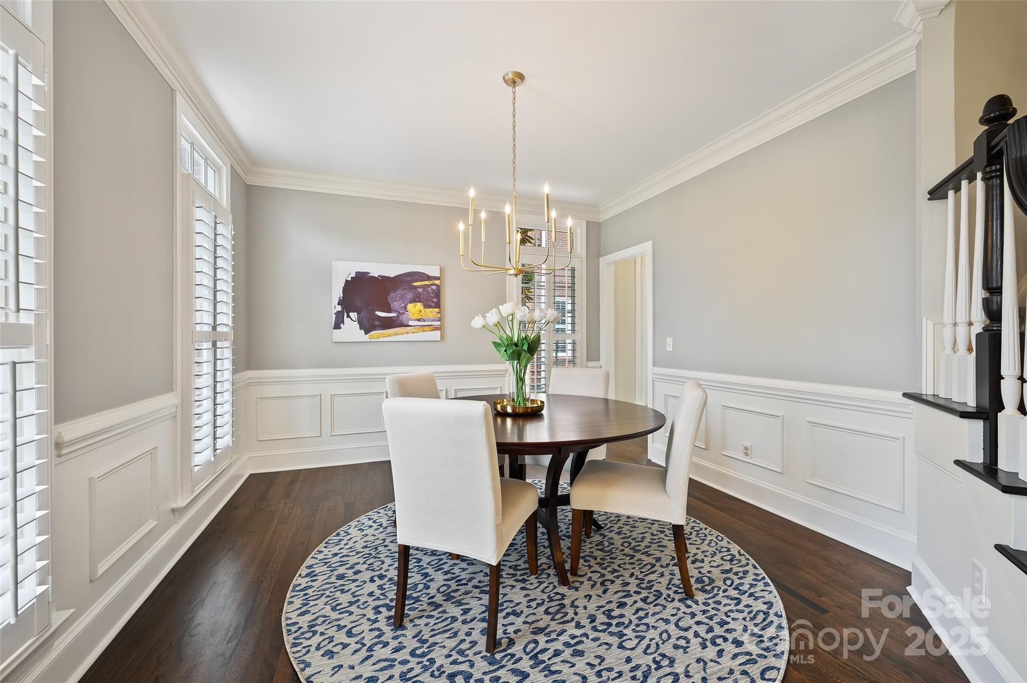 7704 Sharpthorne Place Charlotte, NC 28270 - Photo 9 of 34 a view of a dining room with furniture window and wooden floor