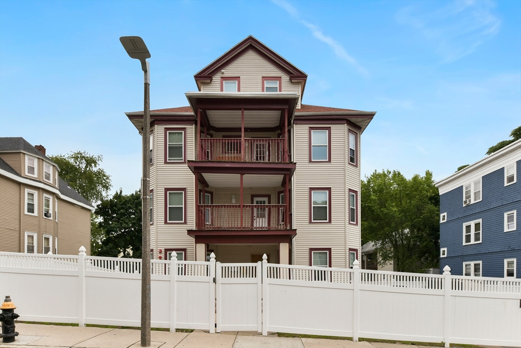 34 Fessenden Street, Unit 2 Boston, MA 02126 - Photo 1 of 21 a front view of a house with garden