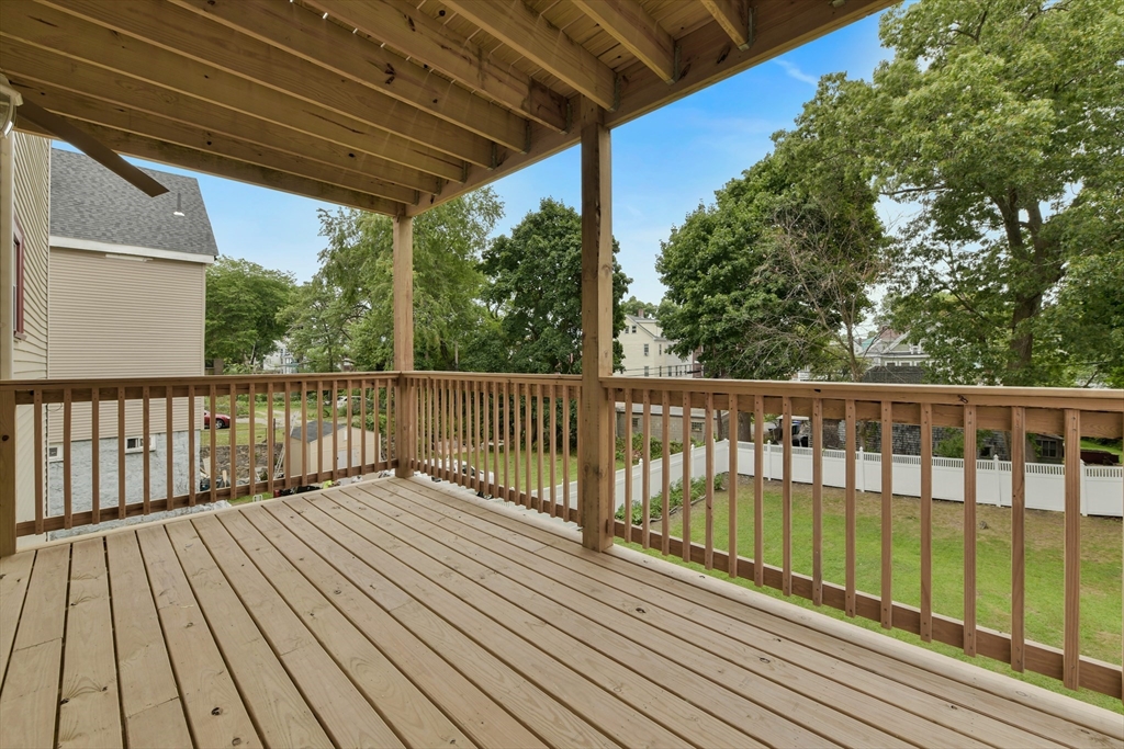 34 Fessenden Street, Unit 2 Boston, MA 02126 - Photo 19 of 21 a view of balcony with wooden floor