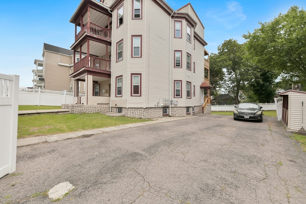 34 Fessenden Street, Unit 2 Boston, MA 02126 - Photo 20 of 21 a view of building with cars parked