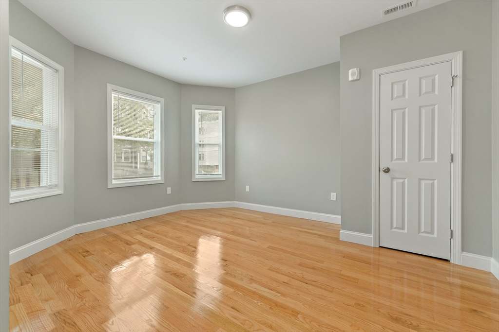 34 Fessenden Street, Unit 2 Boston, MA 02126 - Photo 6 of 21 a view of an empty room with a window