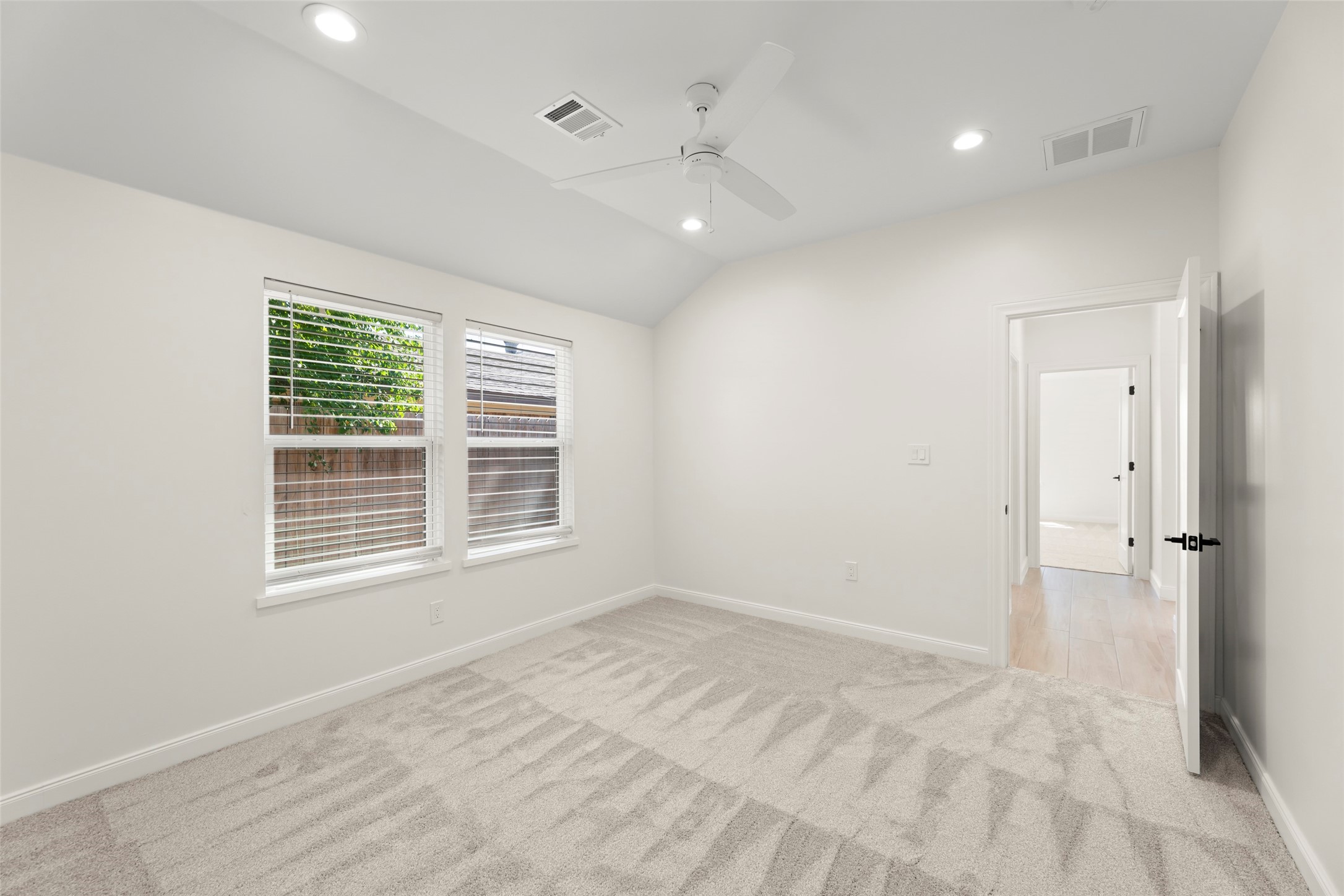 729 Caperton Street Houston, TX 77022 - Photo 20 of 42 a view of an empty room with a window