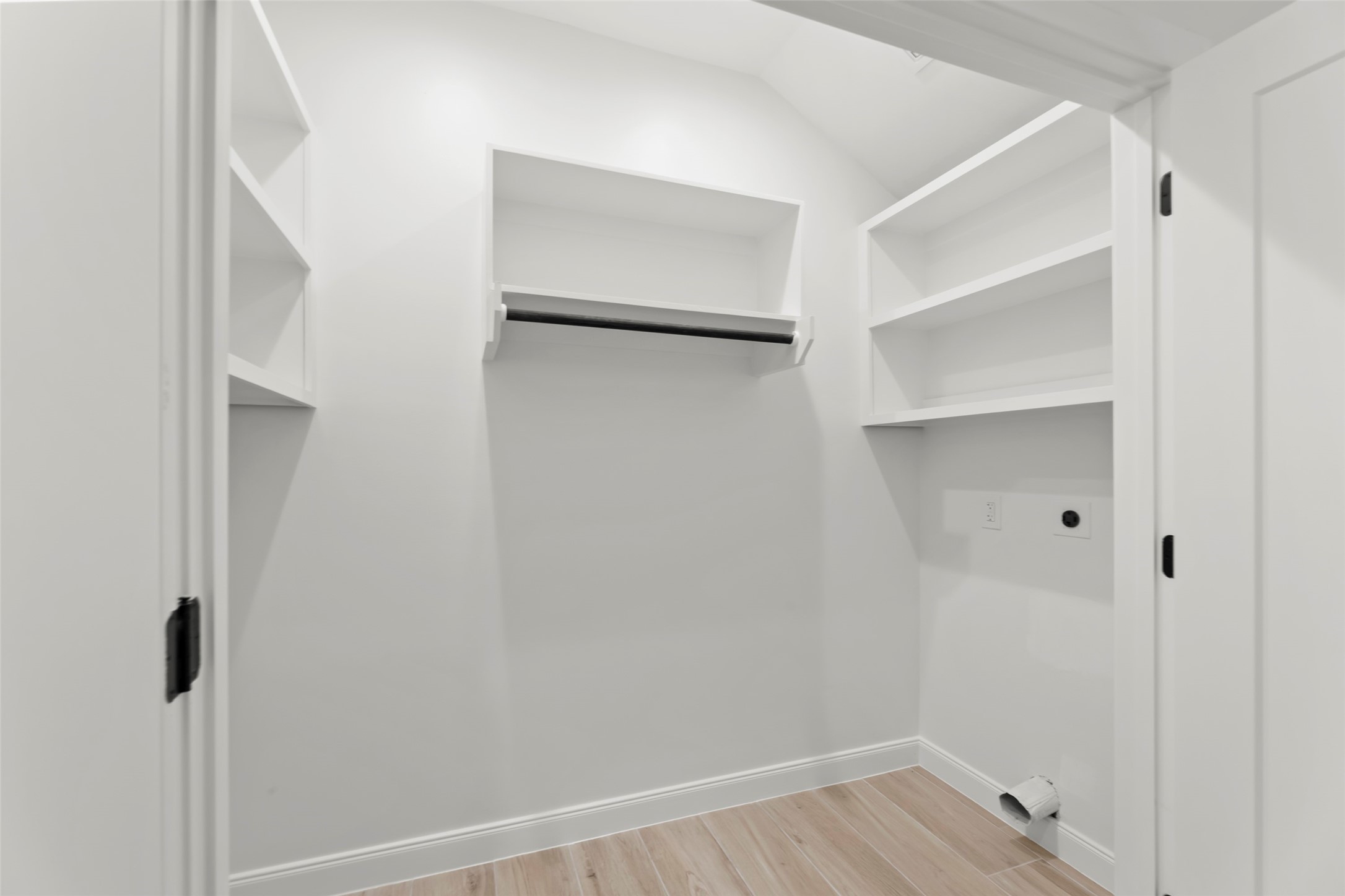 729 Caperton Street Houston, TX 77022 - Photo 21 of 42 a view of an empty walk in closet