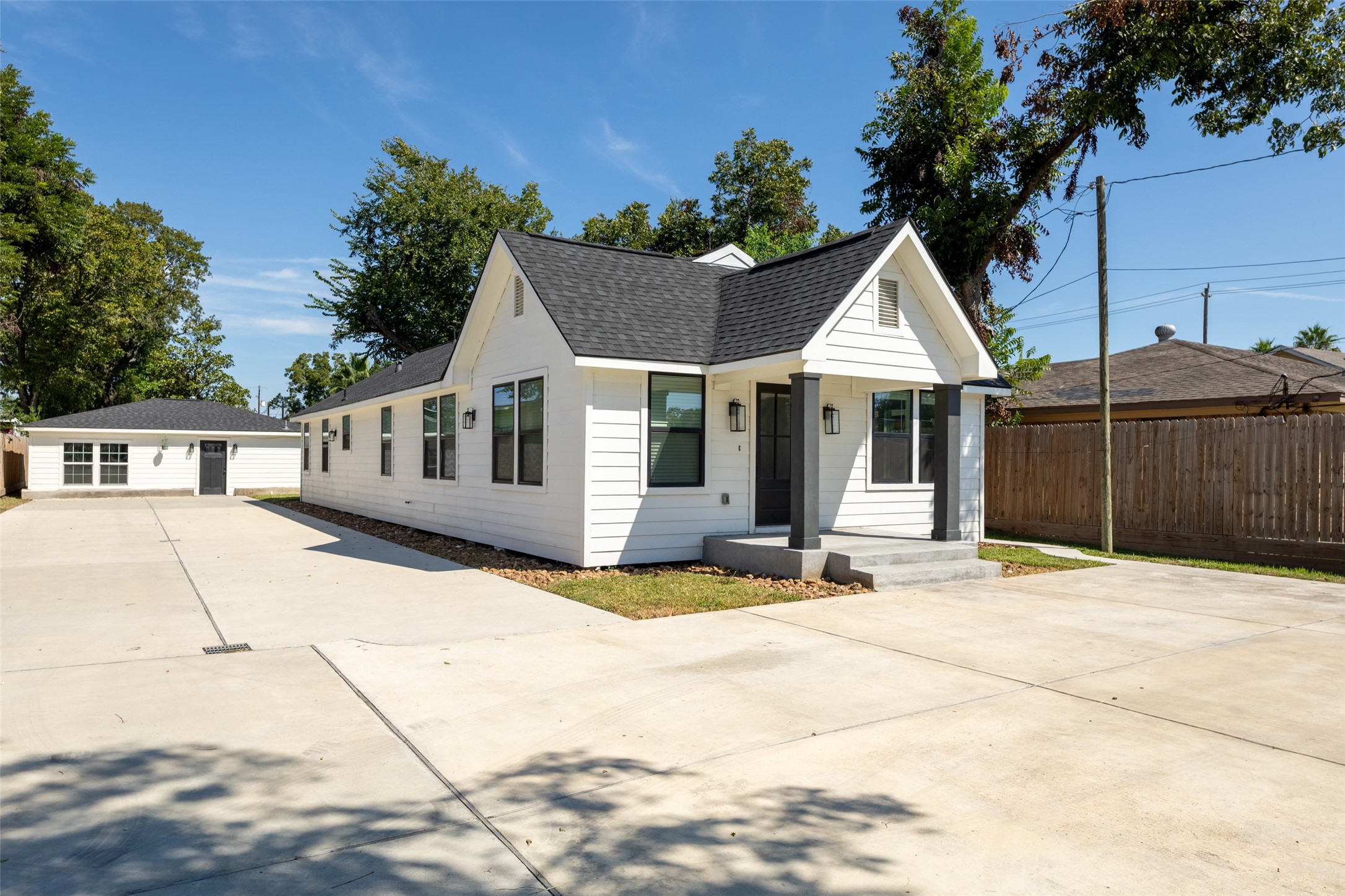 729 Caperton Street Houston, TX 77022 - Photo 3 of 42 a view of a house with table and chairs in front of it