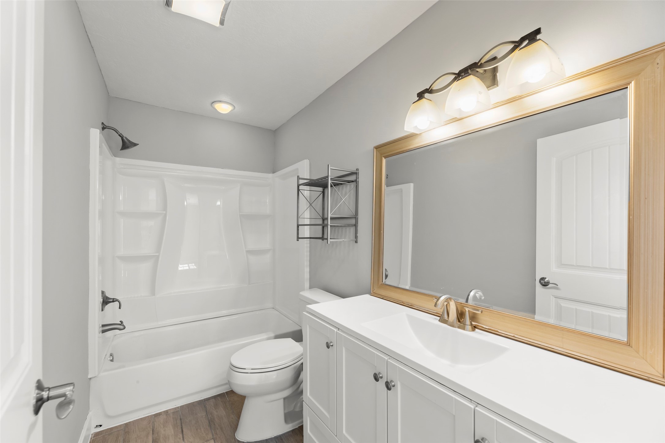 729 Caperton Street Houston, TX 77022 - Photo 33 of 42 a bathroom with a sink a toilet and shower