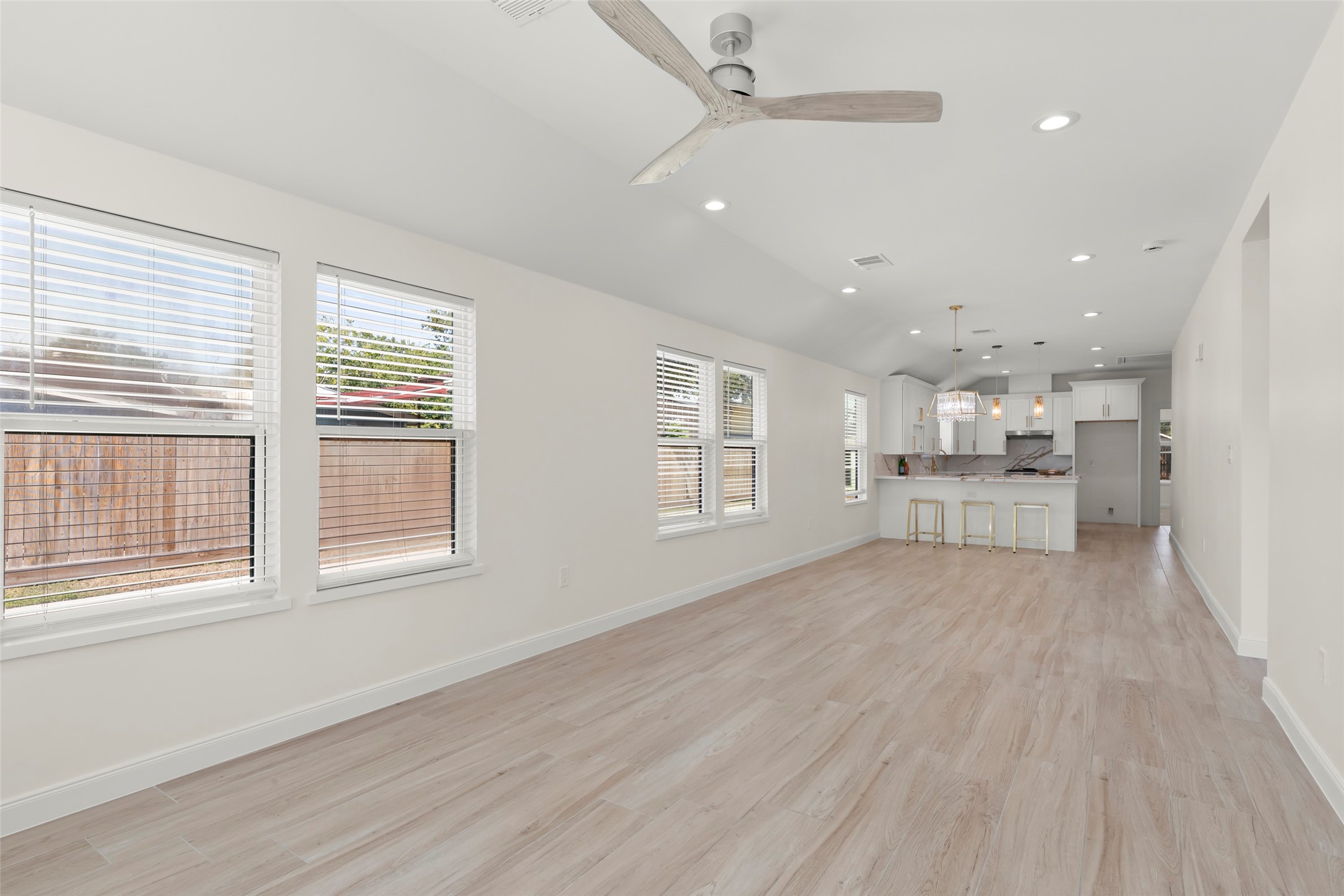 729 Caperton Street Houston, TX 77022 - Photo 6 of 42 a view of an empty room with a window