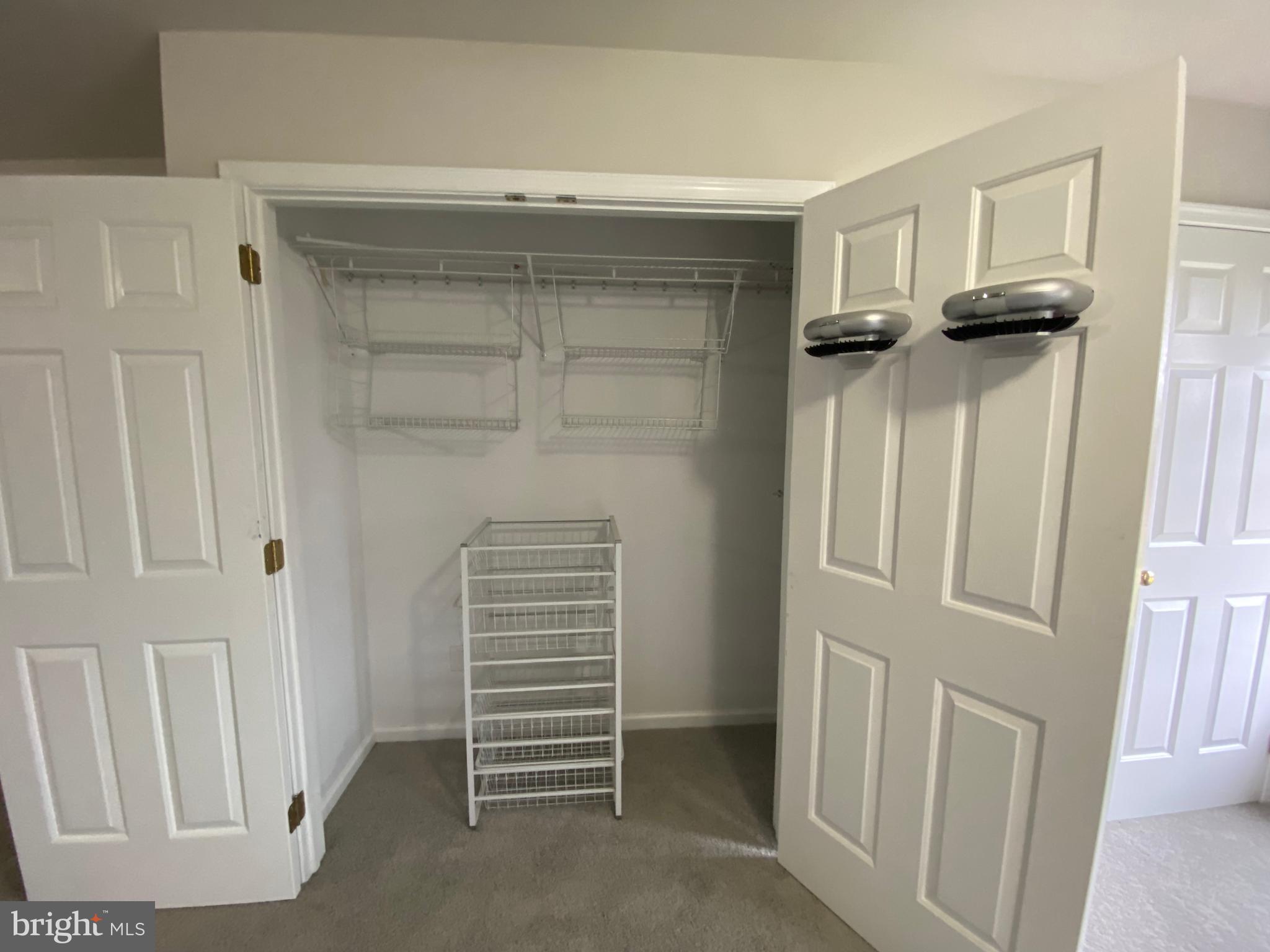 2063 Hill Road, Unit B Perkiomenville, PA 18074 - Photo 23 of 27 a view of walk in closet with empty racks