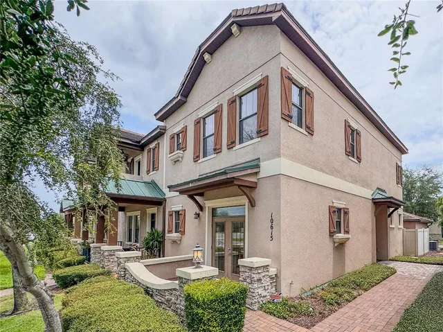 a front view of a house with garden
