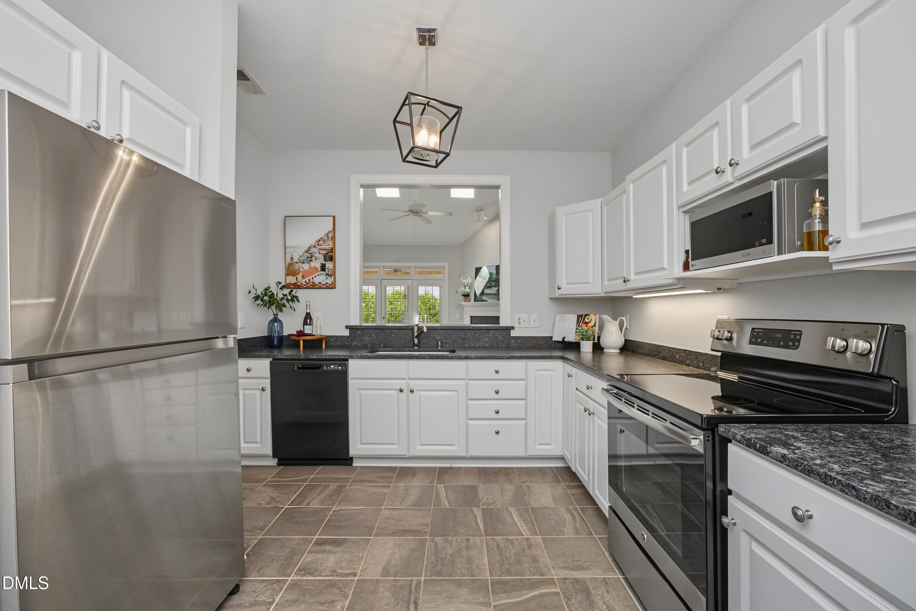 8725 Courage Court Raleigh, NC 27615 - Photo 6 of 41 09Kitchen