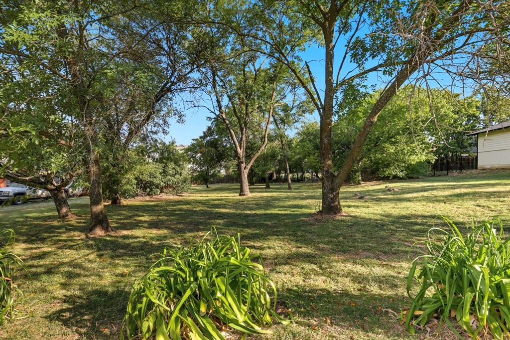 Tbd East 2nd Street Prosper, TX 75078 - Photo 17 of 20 a view of a yard with a tree