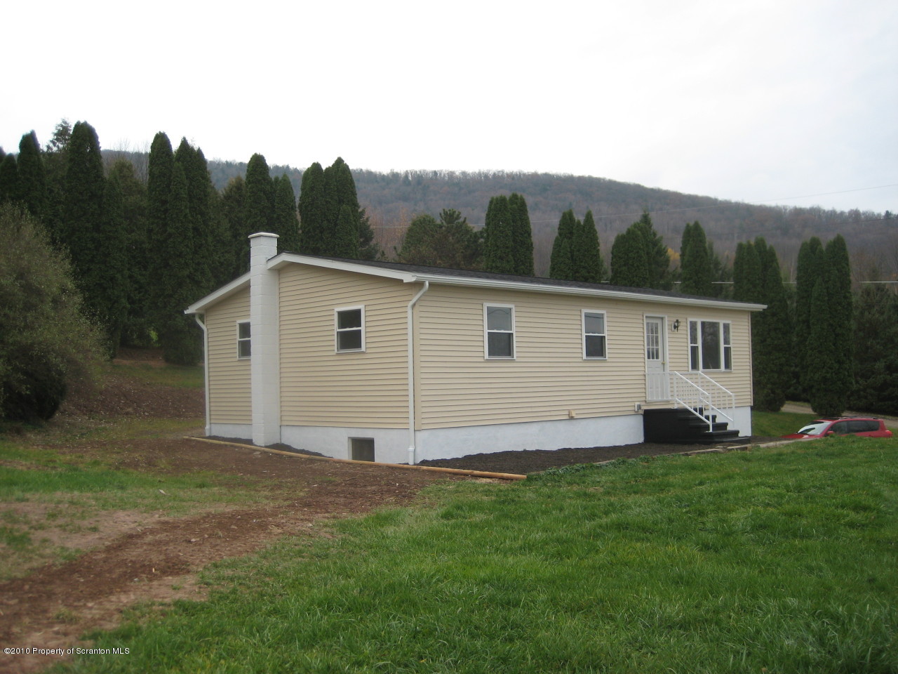 59 John Sheehan Road Mehoopany, PA 18629 - Photo 1 of 9 a view of a backyard with a garden