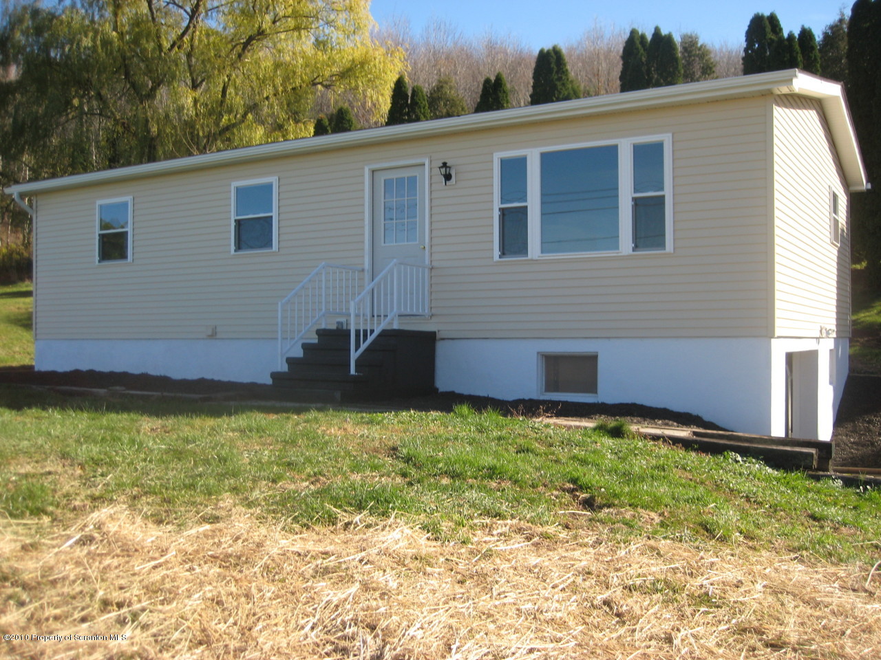 59 John Sheehan Road Mehoopany, PA 18629 - Photo 5 of 9 a backyard of a house with lots of green space