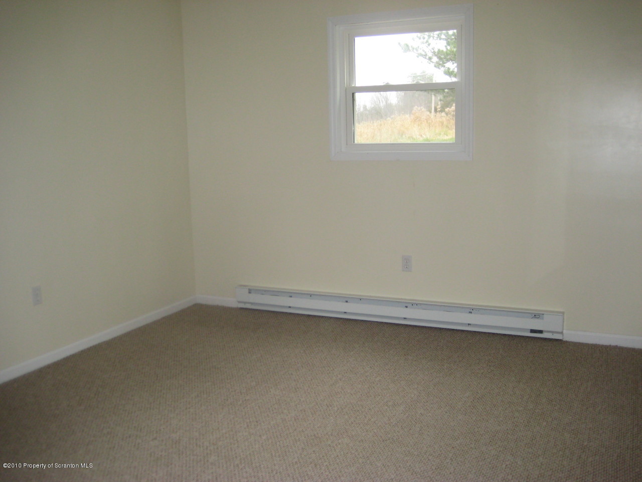 59 John Sheehan Road Mehoopany, PA 18629 - Photo 8 of 9 an empty room with a window