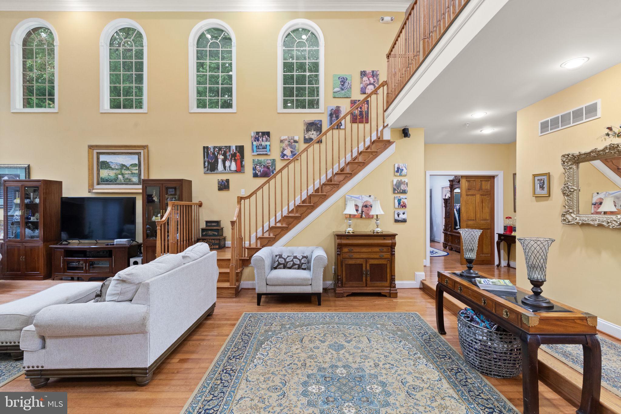 5530 Jim Pickett Road Sykesville, MD 21784 - Photo 11 of 49 a living room with furniture and a flat screen tv