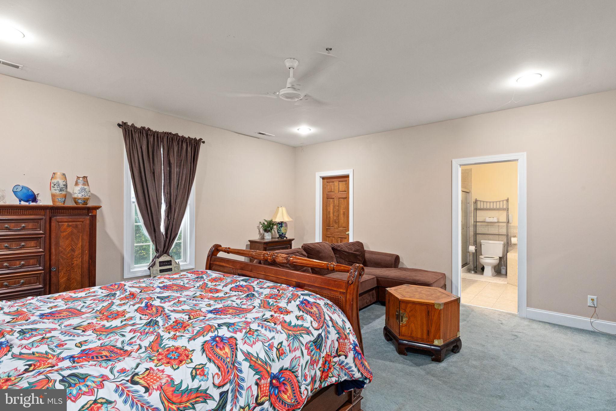 5530 Jim Pickett Road Sykesville, MD 21784 - Photo 35 of 49 a bedroom with bed and a dresser