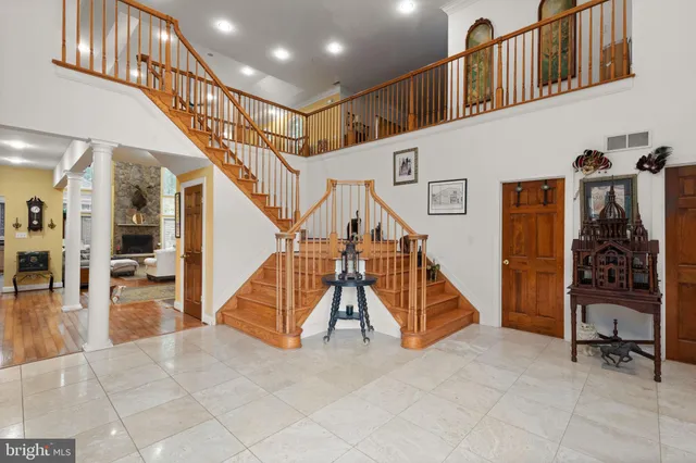 a view of staircase with furniture and stairs