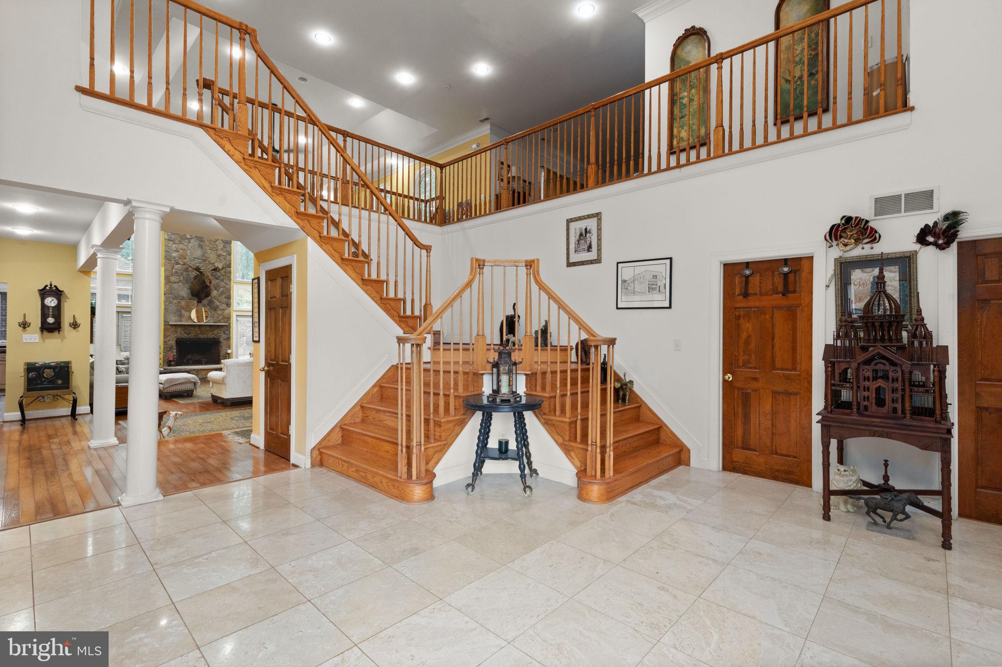 5530 Jim Pickett Road Sykesville, MD 21784 - Photo 4 of 49 a view of staircase with furniture and stairs