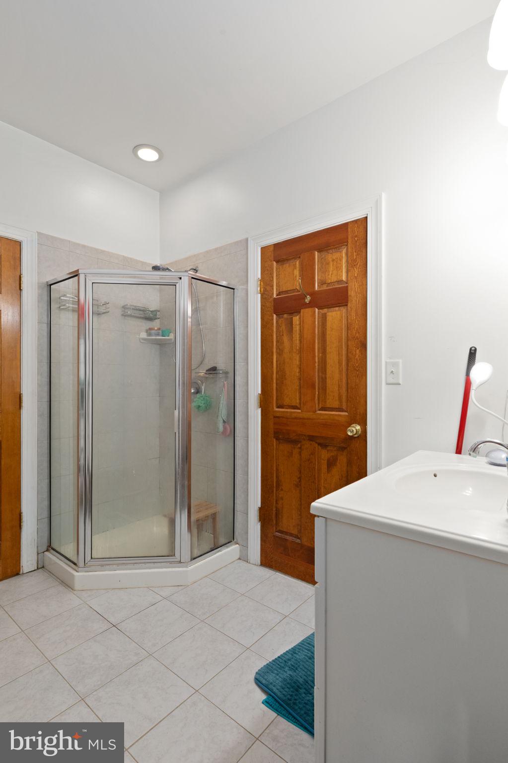 5530 Jim Pickett Road Sykesville, MD 21784 - Photo 42 of 49 a room that has a bed and a mirror