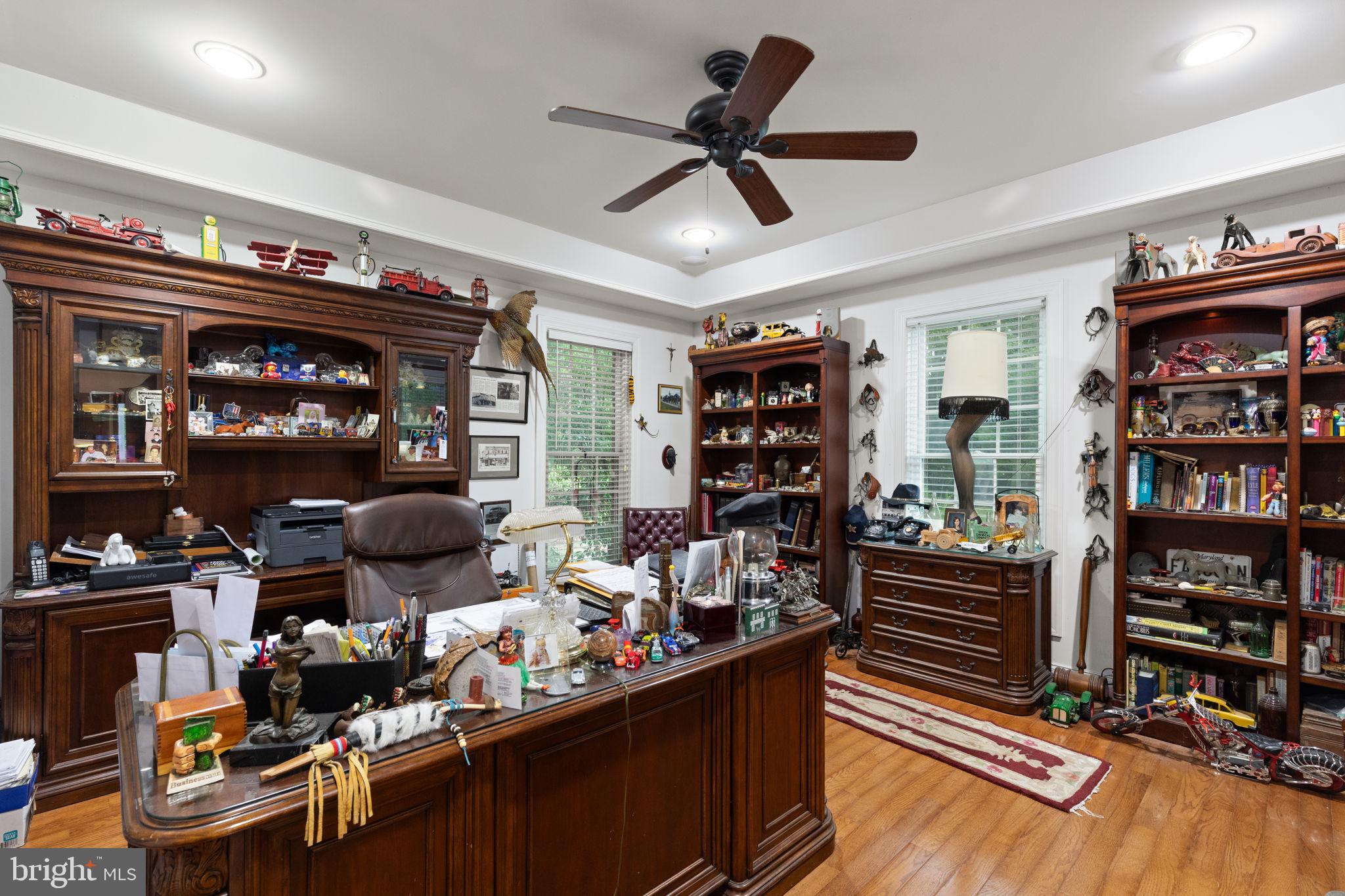 5530 Jim Pickett Road Sykesville, MD 21784 - Photo 6 of 49 a room with lots of wooden furniture and a rug