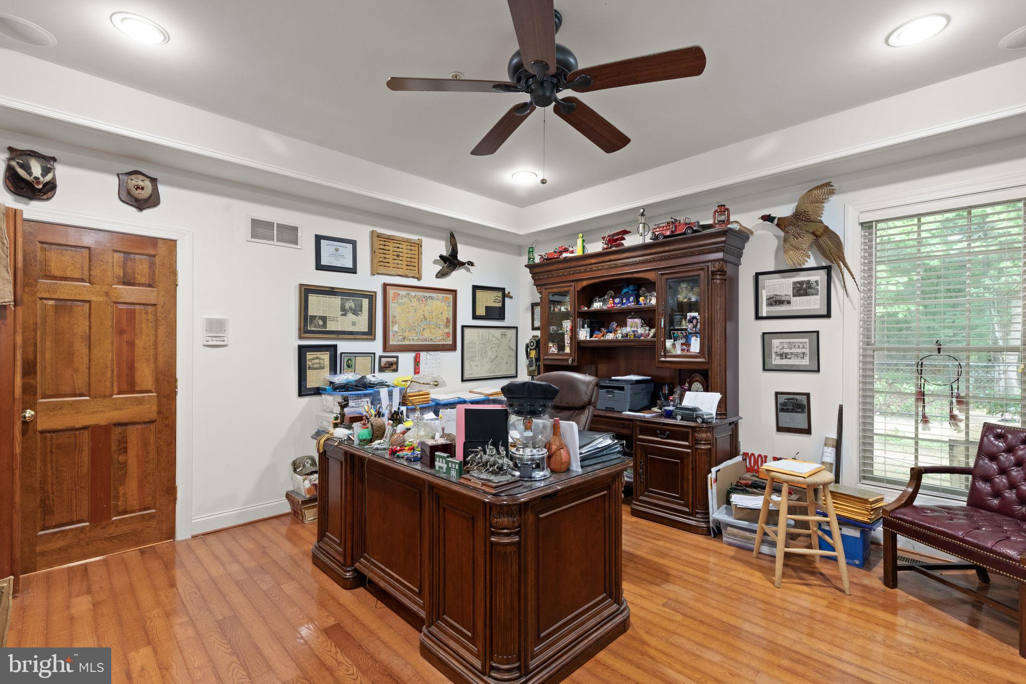 5530 Jim Pickett Road Sykesville, MD 21784 - Photo 7 of 49 a living room with stainless steel appliances granite countertop furniture wooden floor and a window