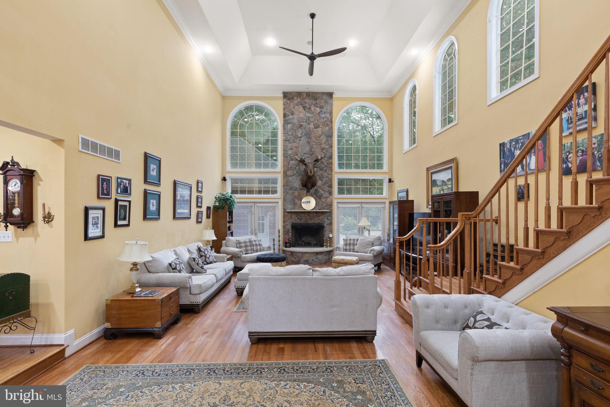 5530 Jim Pickett Road Sykesville, MD 21784 - Photo 10 of 49 a living room with furniture fireplace and flat screen tv
