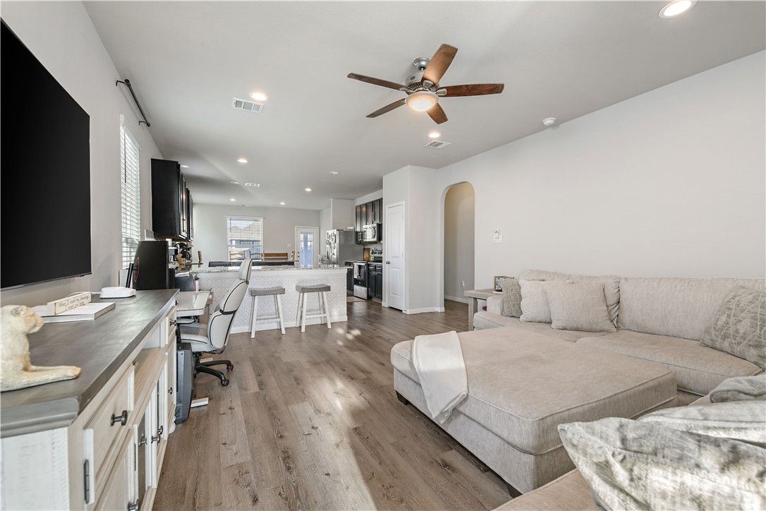 4705 Milagro Loop Bryan, TX 77807 - Photo 5 of 28 a living room with furniture and a large window