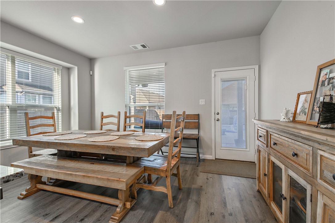 4705 Milagro Loop Bryan, TX 77807 - Photo 7 of 28 a dining room with furniture and window