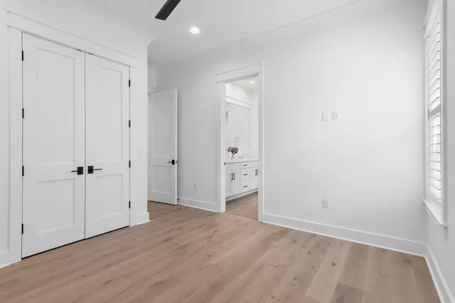 a aerial view of a house next to a yard