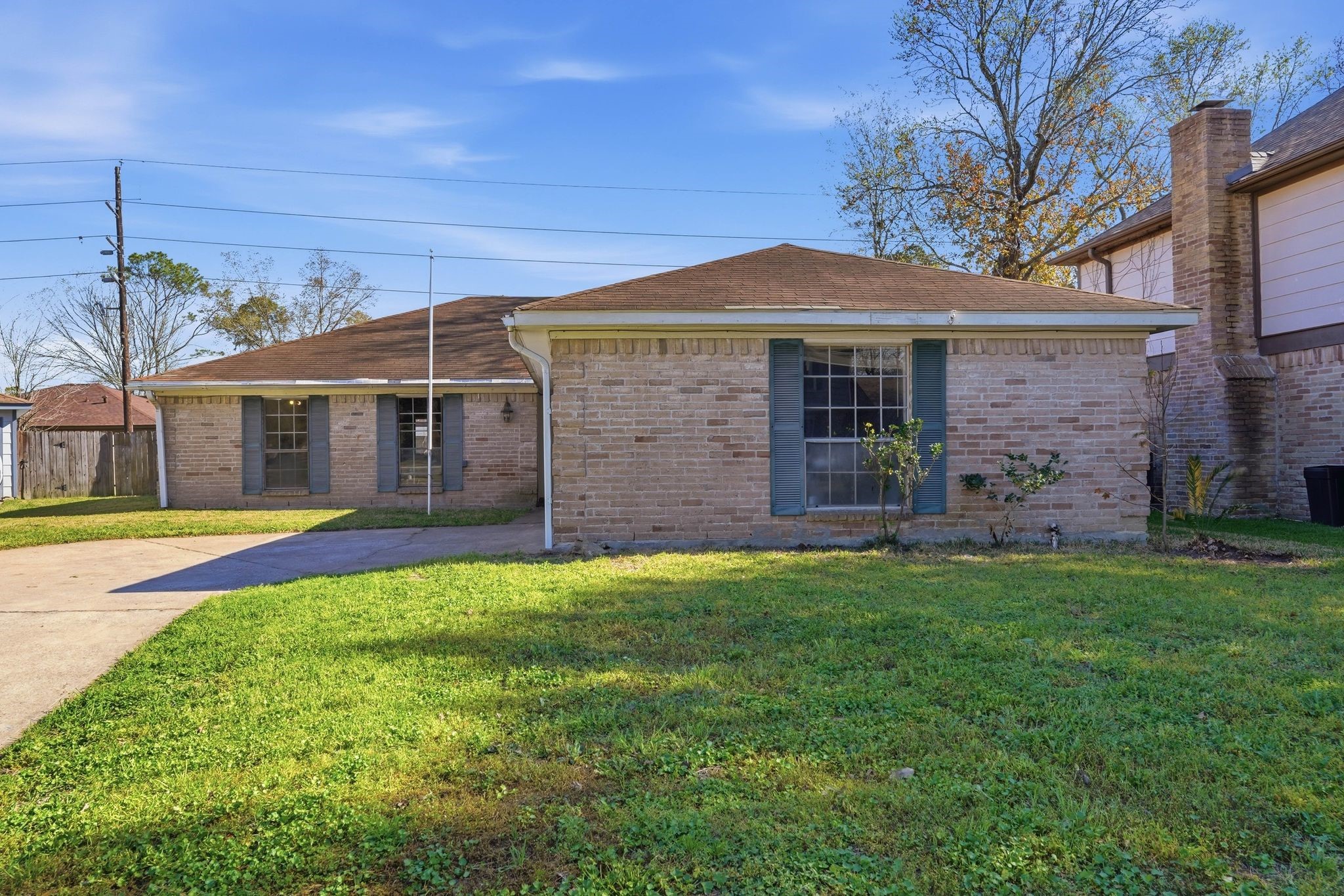 6807 Falling Waters Drive Spring, TX 77379 - Photo 2 of 22 a front view of a house with a yard