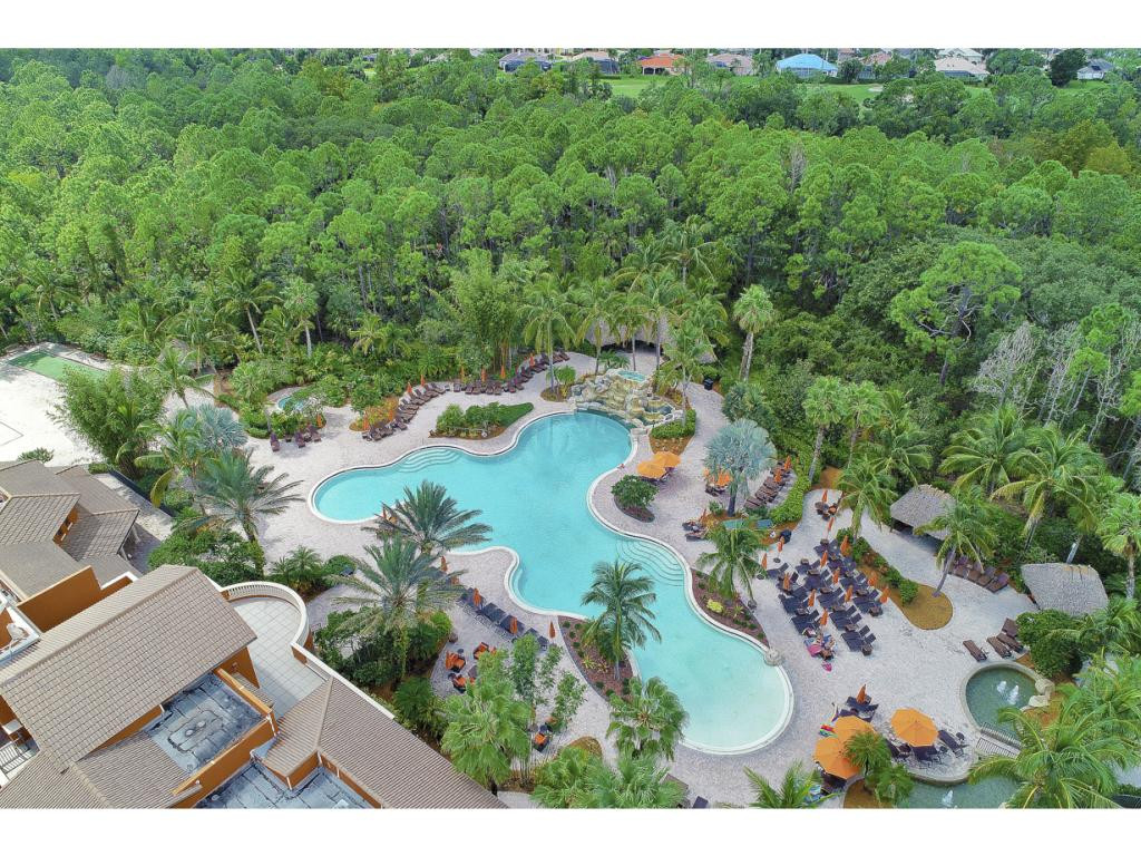 9041 Alturas Street, Unit 3803 Naples, FL 34113 - Photo 17 of 18 an aerial view of a house with a yard