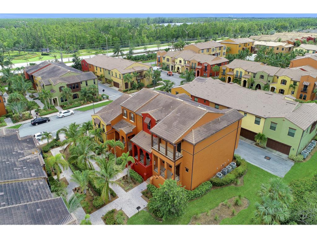 9041 Alturas Street, Unit 3803 Naples, FL 34113 - Photo 10 of 18 an aerial view of a house with a garden