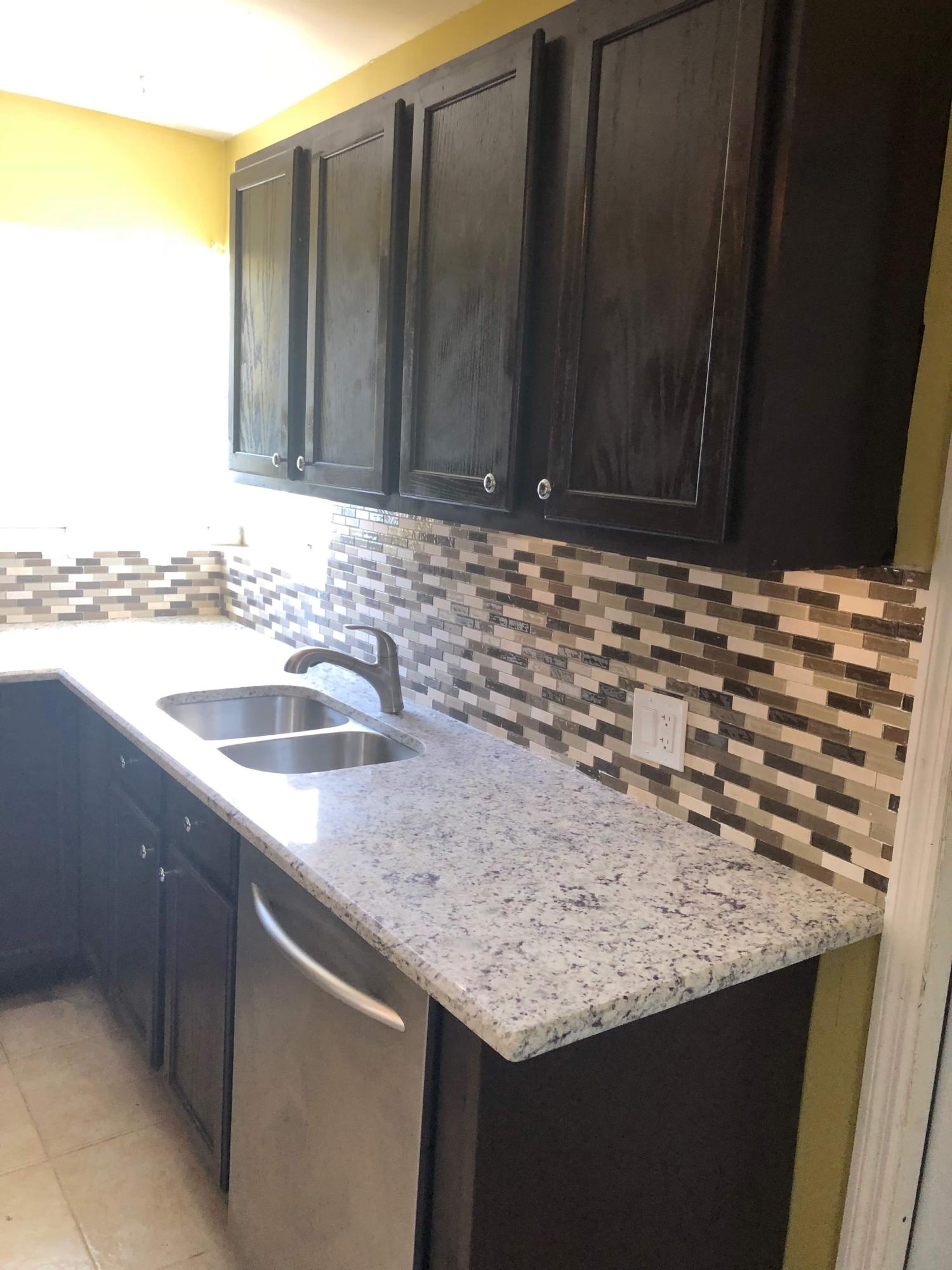 57 West 28th Street Riviera Beach, FL 33404 - Photo 3 of 25 IMG_2359