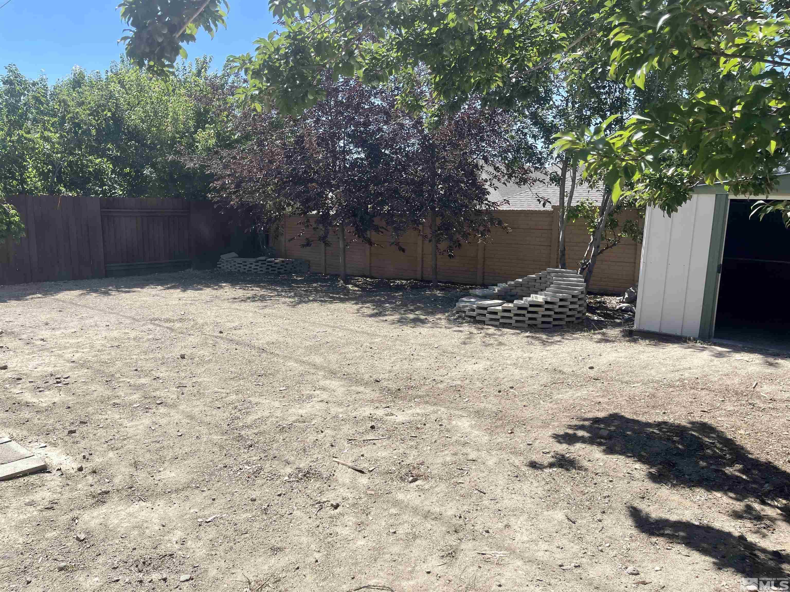 5998 Walnut Creek Road Reno, NV 89523 - Photo 10 of 10 a backyard of a house