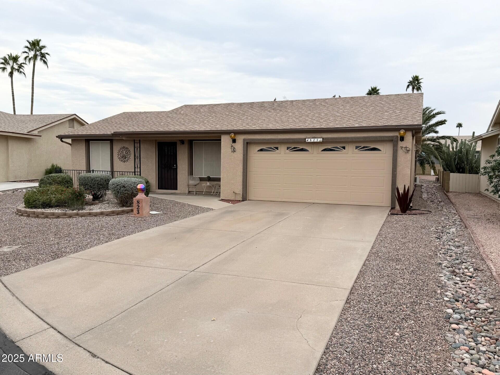 823 South 79th Way Mesa, AZ 85208 - Photo 2 of 46 a view of a house with a terrace