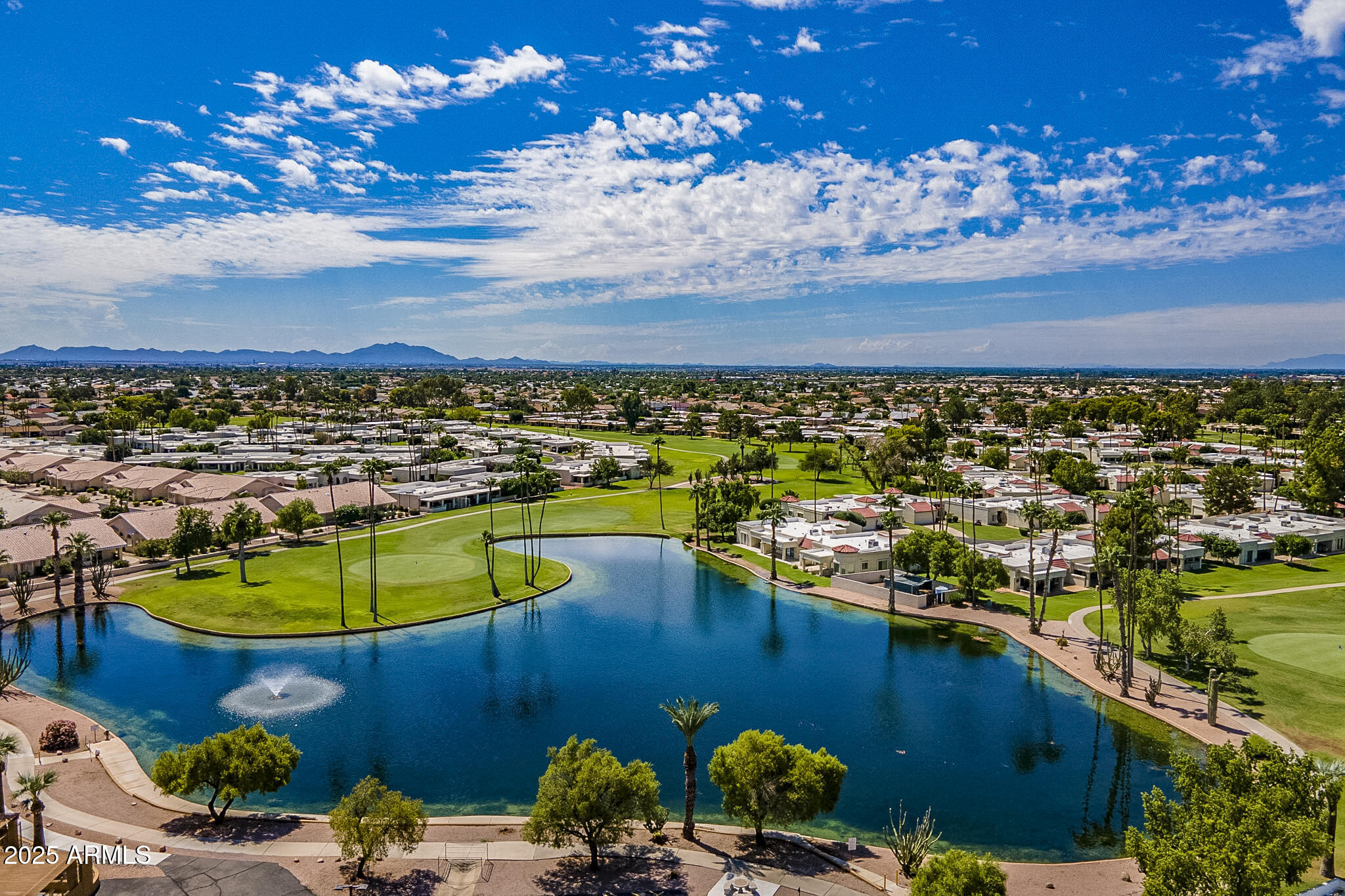 823 South 79th Way Mesa, AZ 85208 - Photo 31 of 46 a view of a lake with a nearby beach