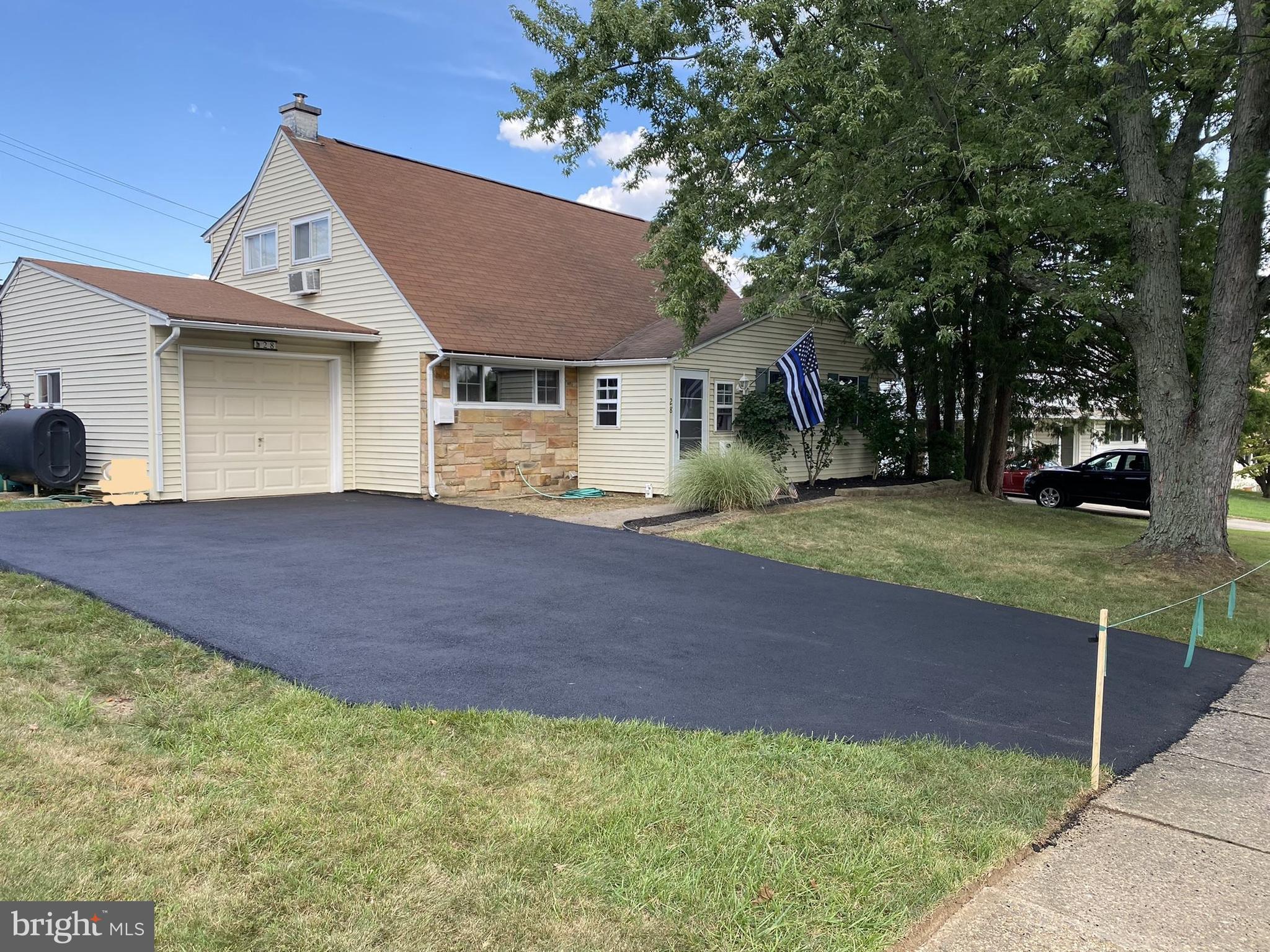 28 Hillside Road Levittown, PA 19056 - Photo 37 of 52 Expanded driveway freshly coated 8/25/22