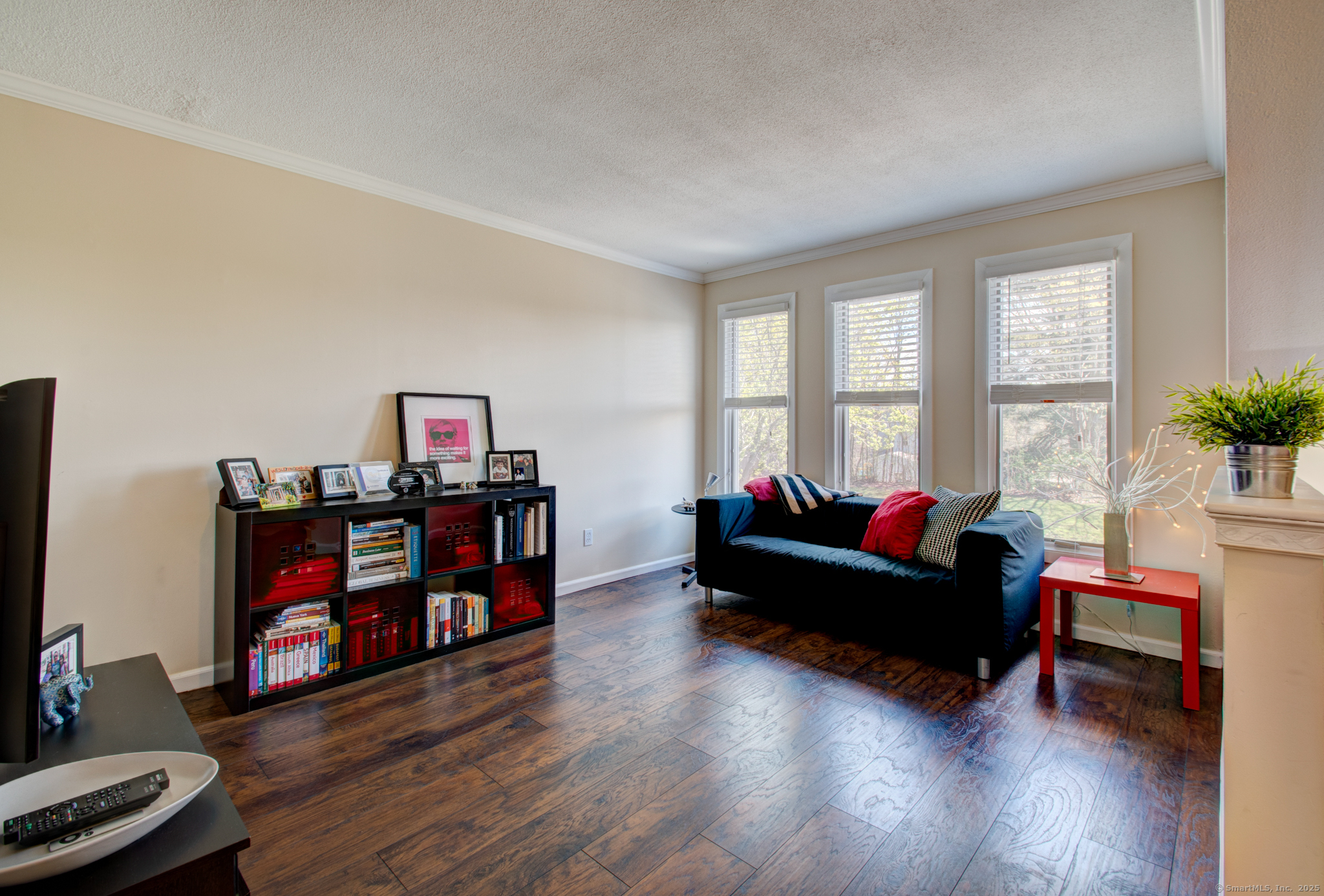 184 Gravel Street, Unit 26 Meriden, CT 06450 - Photo 8 of 27 a living room with furniture window and wooden floor