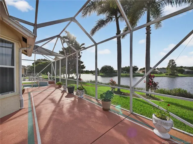 a view of yard with a patio