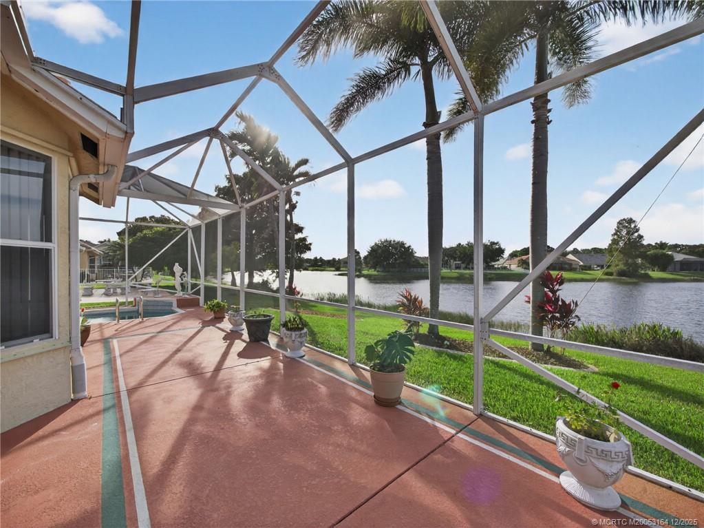 618 Southwest Lake Charles Circle Port St. Lucie, FL 34986 - Photo 27 of 29 a view of yard with a patio