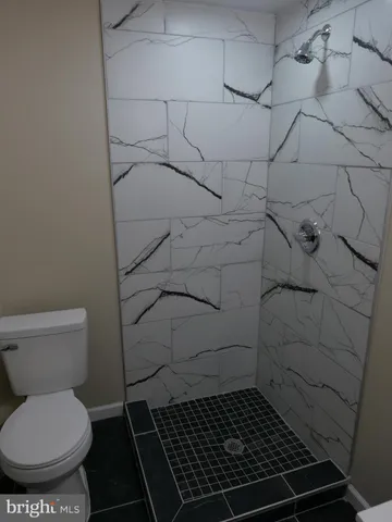a bathroom with a toilet