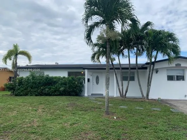 a view of a backyard with a plants