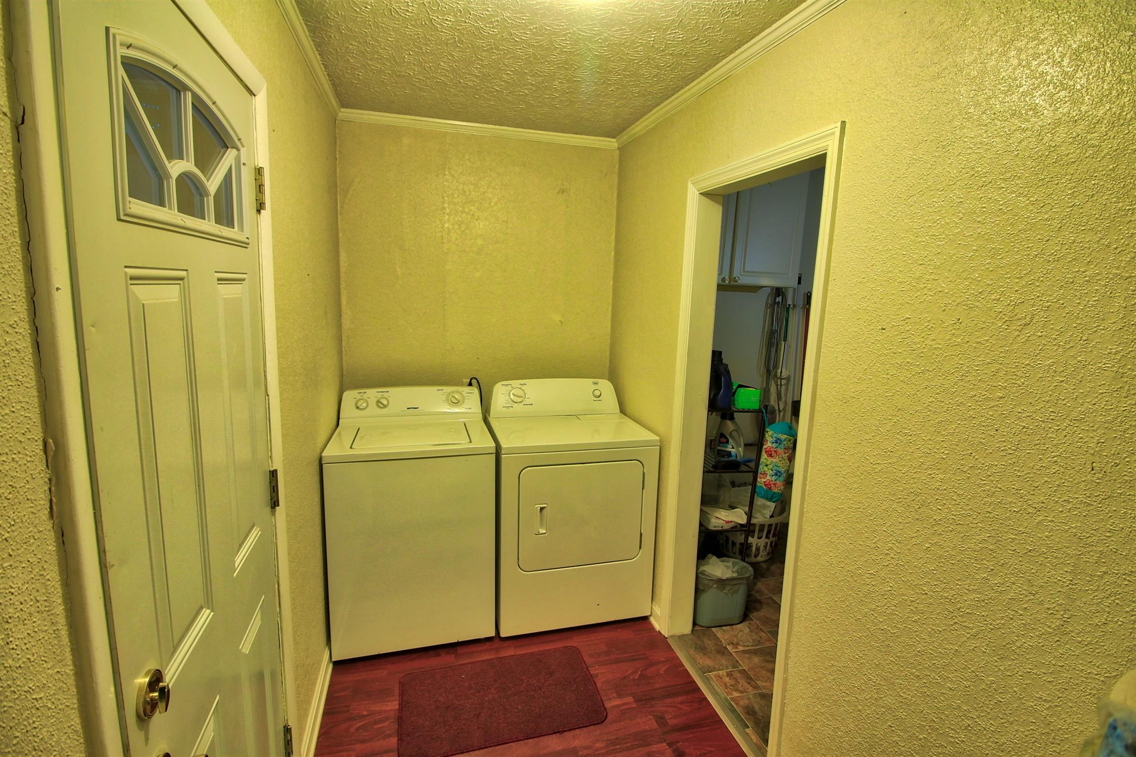 350 Jim Courtney Road Portland, TN 37148 - Photo 13 of 16 a utility room with a sink