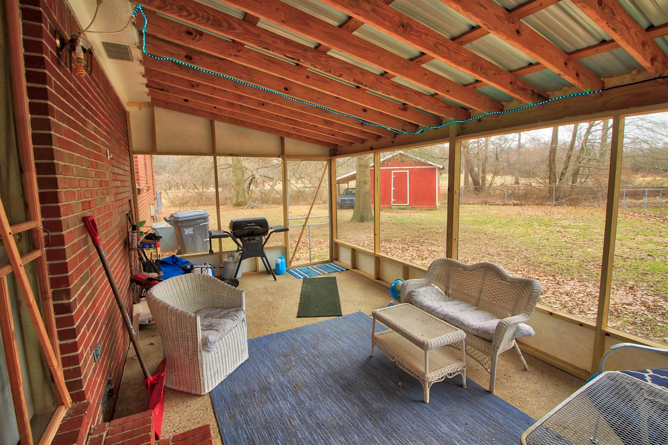 350 Jim Courtney Road Portland, TN 37148 - Photo 15 of 16 a living room with furniture next to a large window