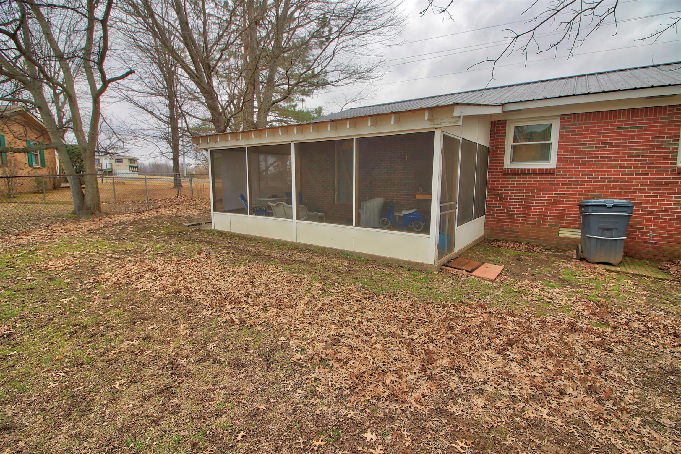350 Jim Courtney Road Portland, TN 37148 - Photo 16 of 16 a view of a house with a yard