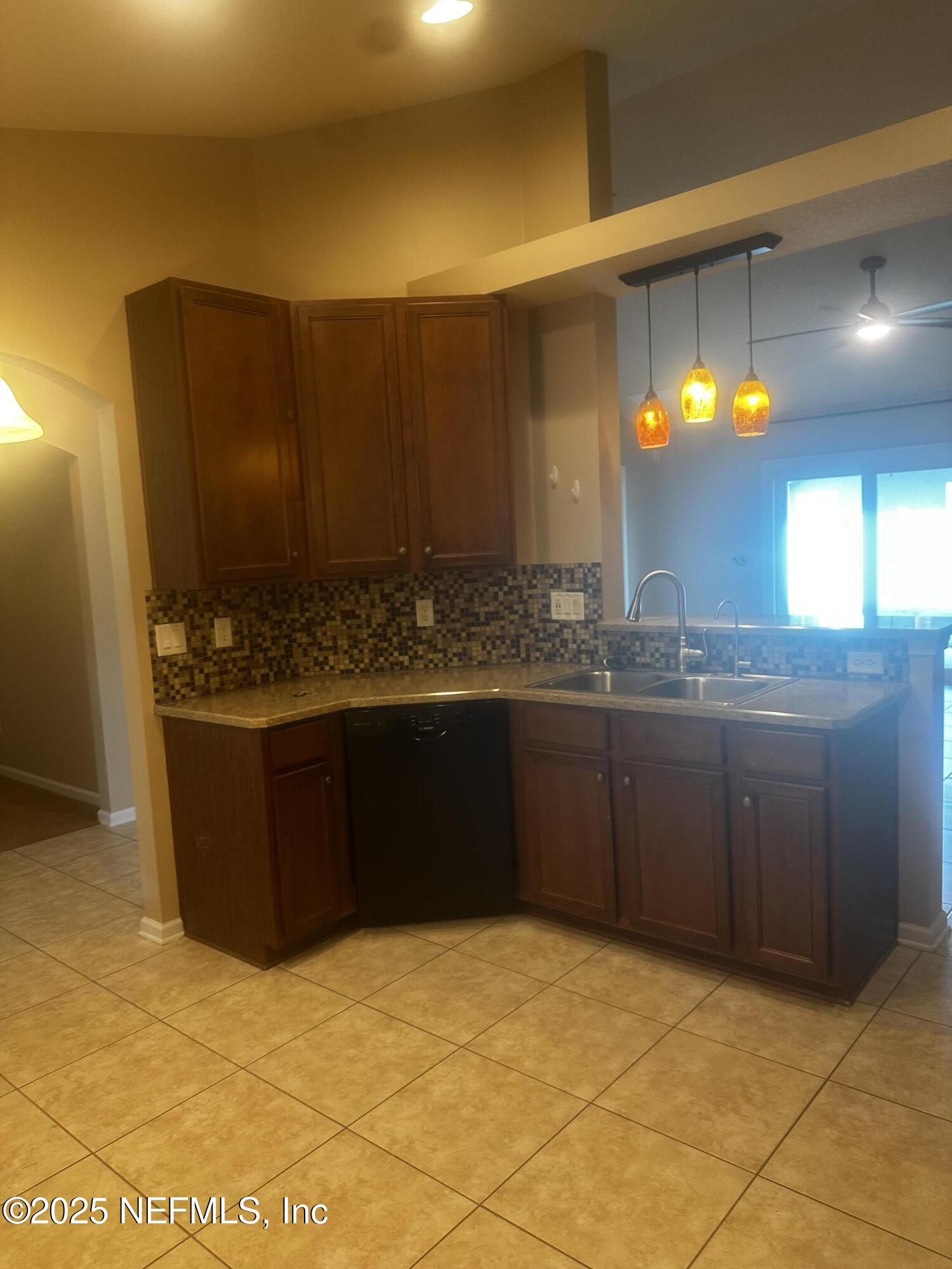 45157 Ingleham Circle Callahan, FL 32011 - Photo 16 of 48 a kitchen with a sink