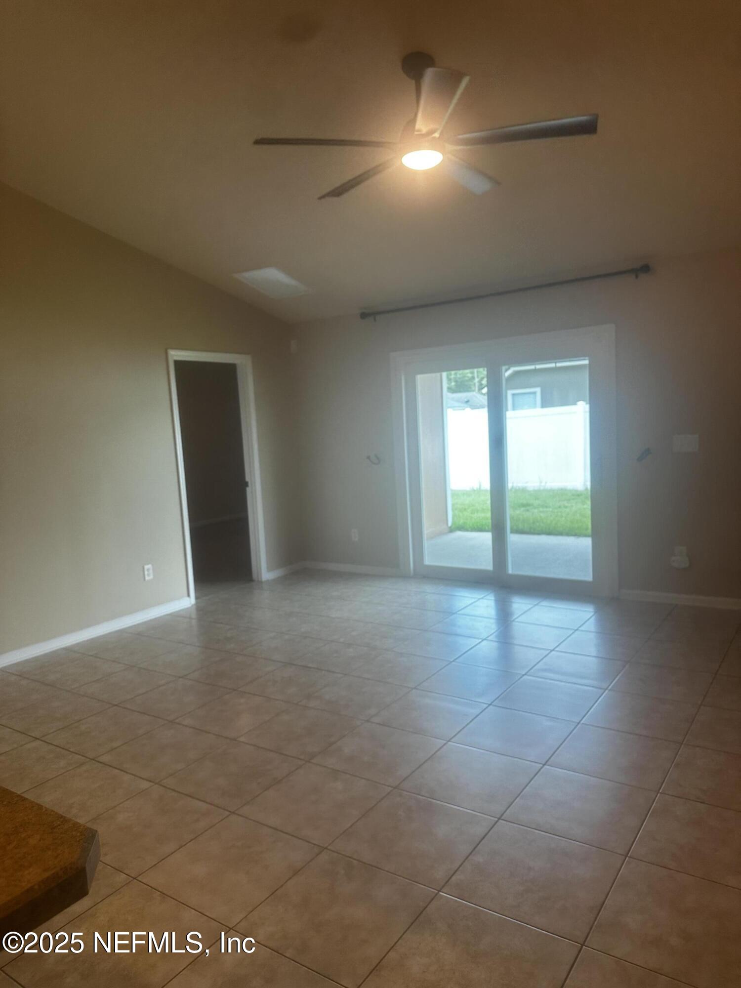 45157 Ingleham Circle Callahan, FL 32011 - Photo 18 of 48 a view of an empty room with a window